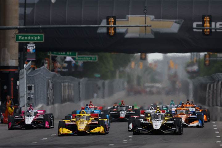 The green flag flies above the start of the Detroit Grand Prix